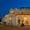 Отель отеля Whispering Palms Beach 4*  (Уисперинг Палмс Бич Резорт)
