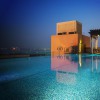 бассейн в вечернее время суток отеля Sofitel Dubai Jumeirah Beach 5*  (Софитель Дубай Джумейра Бич)