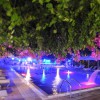 бассейн в вечернее время суток отеля Corfu Hotel 3*  (Корфу Хотел)